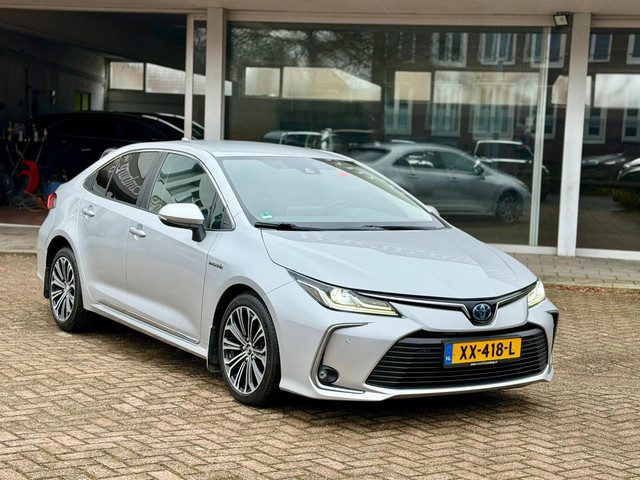 Toyota Corolla 1.8 Hybrid Style|Nieuwstaat|Origineel Nederlands|Nav|Camera|Trekhaak