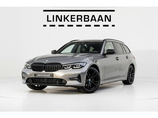 BMW 3 Serie touring 320i | Sportline | Leder | LED | Trekhaak | 19 inch | NL Auto |