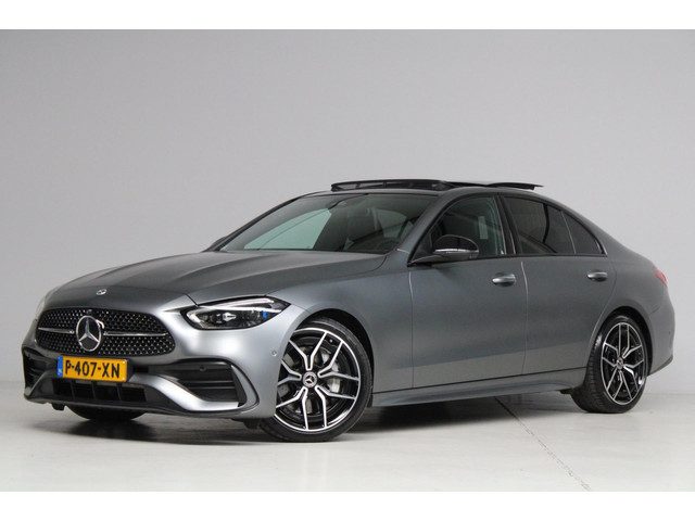 Mercedes-Benz C-Klasse 180 AMG Line Night Pakket Magno Grey | panoramadak | laser led | elek. stoele