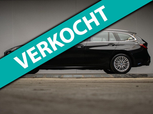 BMW 3 Serie touring 320e M Sport (PANORAMADAK,APPLE CARPLAY,NAVI,SFEERVERLICHTING,STOELVERWARMING,CA