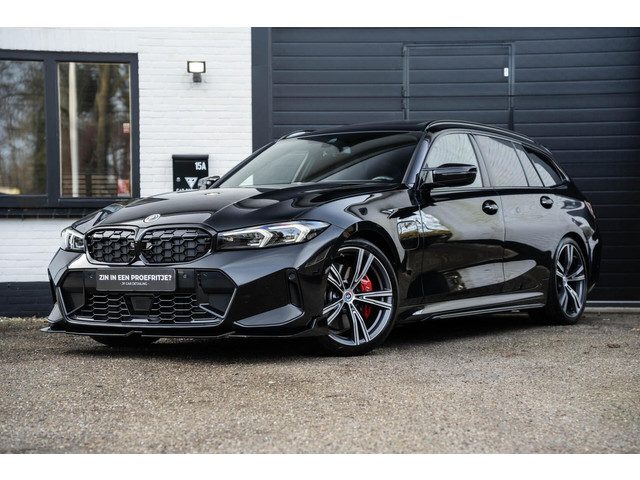 BMW 3 Serie touring 330e M Zetels Pano H&K HU Trekhaak