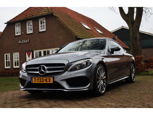 Mercedes-Benz C-Klasse Coupé 220 d Prestige Aut. | AMG-Pakket | Panorama | Slechts 75.000KM | Stoelv