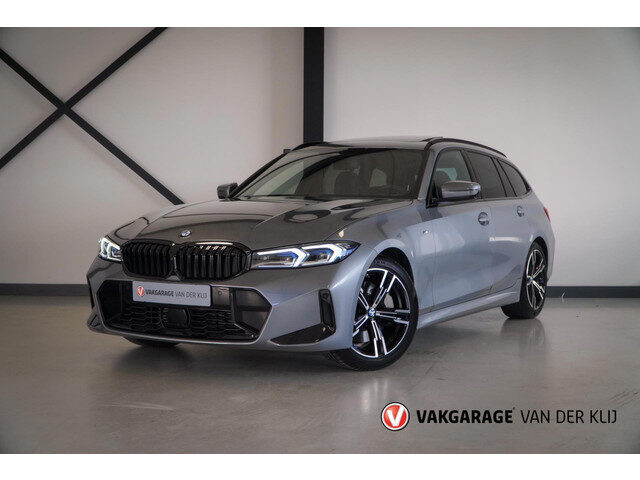 BMW 3 Serie touring 330d M-Sport | Panorama | Trekhaak | Driving Ass. Prof | 360 Camera | Memory Sea