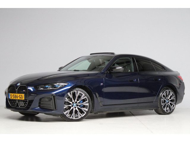 BMW i4 M50 M-sport | schuifkanteldak | adap. cruise | head-up | 360 camera | harmankardon | elek. tr