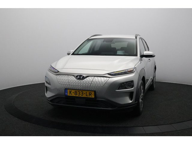 Hyundai Kona EV Fashion 64 kWh 3- Fase SOH 96,1% | Warmtepomp | Camera | Navigatie | Head-Up Display