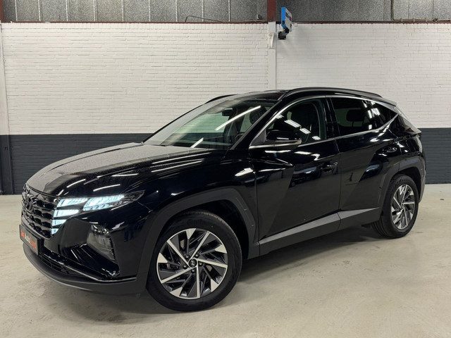 Hyundai Tucson 1.6 T-GDI MHEV i-Motion / Leder / Trekhaak / Carplay / Camera / Elektrische stoel