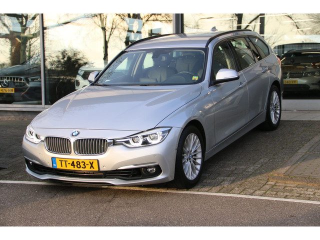 BMW 3 Serie touring 318i Luxury Edition DEALER OND. NL-AUTO NAP!