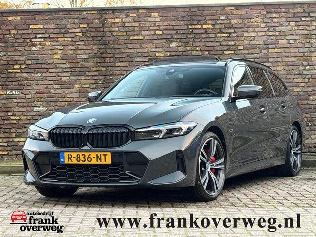 BMW 3 Serie touring 320E M-Sport Pro Pakket Panodak 19 Inch Trekhaak Leer Head-Up