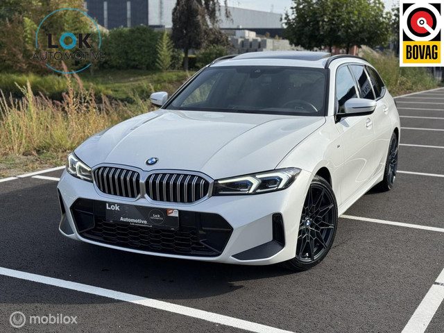 BMW 3 Serie touring 320i PANO|LED|TRKHK|MEMORY|CAMERA|SFEER