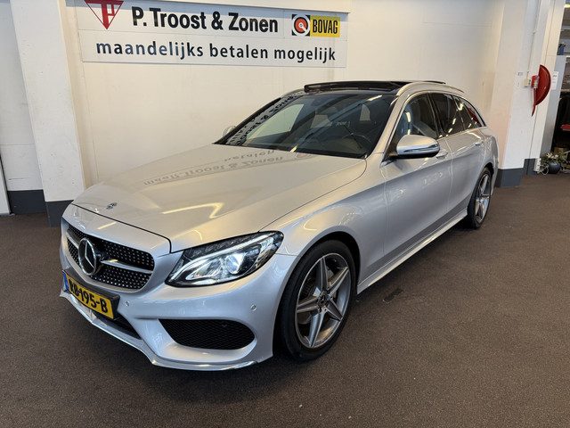 Mercedes-Benz C-Klasse Estate 180 AMG Line | Panoramadak | Lederen bekleding | Trekhaak | Cruise con