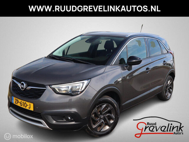 Opel Crossland X 1.2 Turbo 110 PK H6 120 Jaar Edition Zwart Dak+Spiegels Camera NaviApp DonkerGlas P