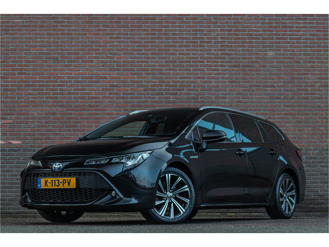 Toyota Corolla 2.0 Hybrid Business Plus, 1e eigenaar, Stoelverwarming, Keyless, Trekhaak, Half leder