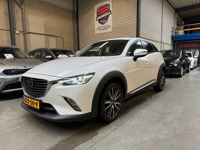 Mazda CX-3 2.0 SkyActiv-G 120 TS BOM VOL OPTIES PARELMOER NAVI/CAMERA CRUISE 18 INCH ZWART LEDER BOS