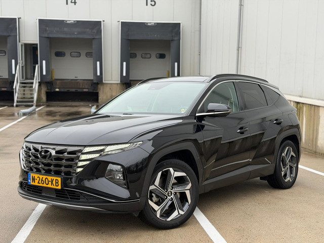 Hyundai TUCSON Hybrid 1.6 T-GDI PHEV Premium Sky 4WD, panoramadak, alle opties, zwart metallic, 1 e