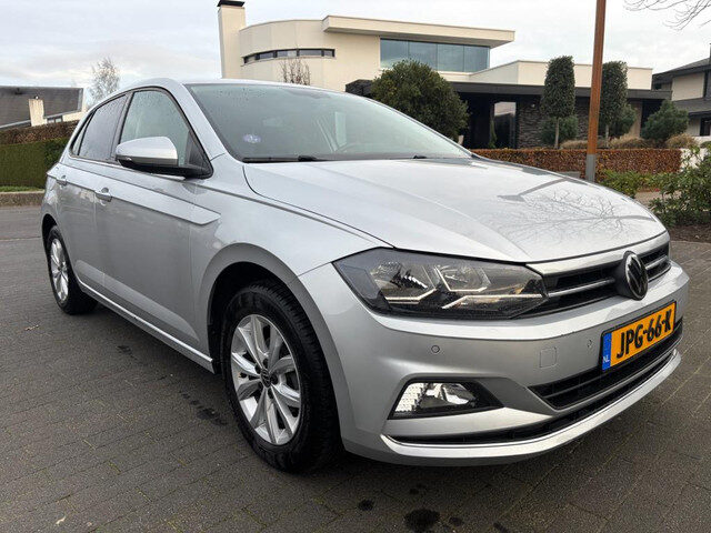 Volkswagen Polo 1.0 TSI Highline b.t.w. auto navigatie trekhaak airco sport velgen.