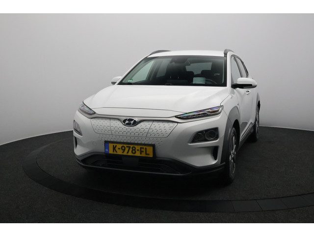 Hyundai Kona EV Fashion 64 kWh 3- Fase SOH 95,2% | Warmtepomp | Camera | Navigatie | Head-Up Display