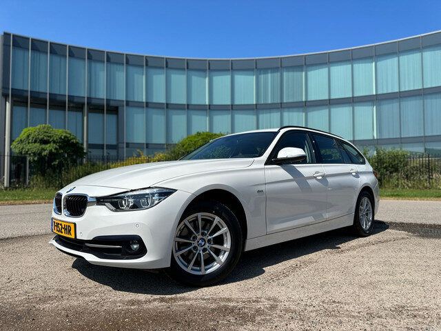 BMW 3 Serie touring 320i X-Drive High Executive