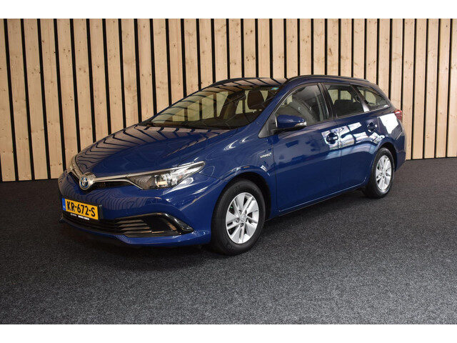 Toyota Auris Touring Sports 1.8 Hybrid Now 1e eig. Trekhaak Clima Isofix Dagdragers Lm-velgen NL-aut