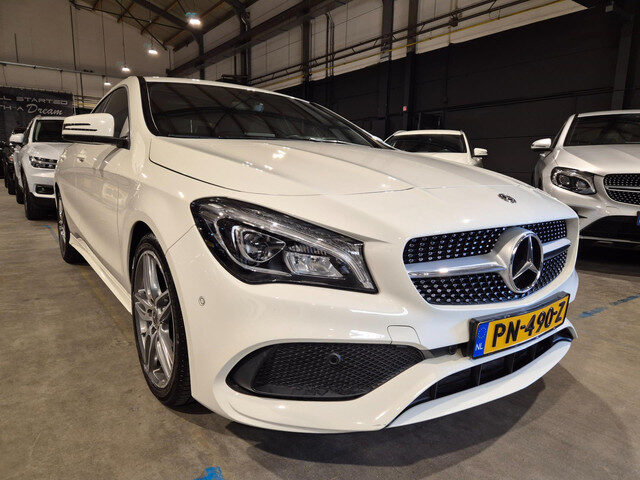 Mercedes-Benz CLA 180 Business Solution AMG - Clima - Cruise - Navigatie - Camera - Stoelverwarming
