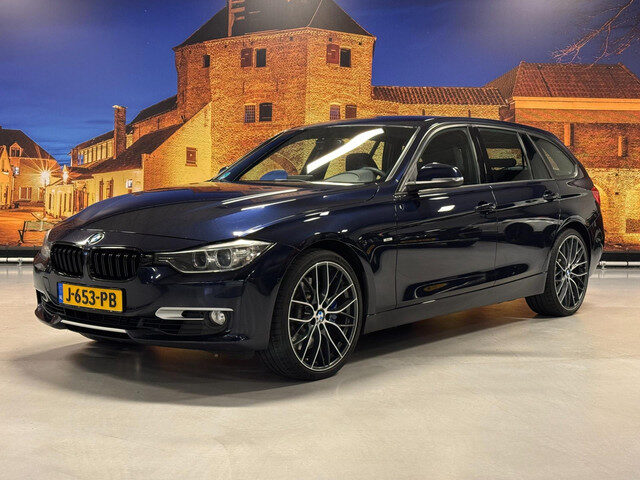 BMW 3 Serie touring 335i xDrive High Exe Aut Leer Camera Xenon