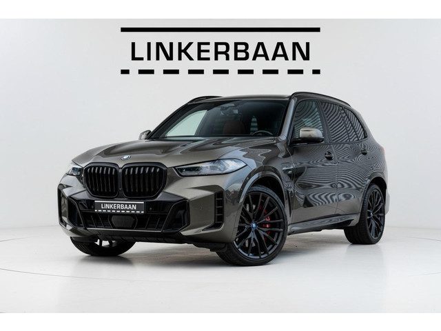 BMW X5 xDrive50e Hybride | Uniek | M Sport | Pano | H&K | Massage | Trekhaak | 22 inch | NL auto |