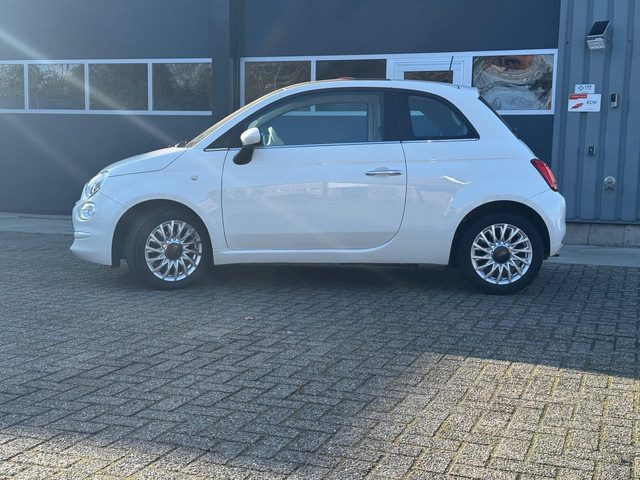 Fiat 500 1.2 Lounge met panorama dak, heeft nog maar 57147 kilometer gelopen. Hij ziet er keurig net