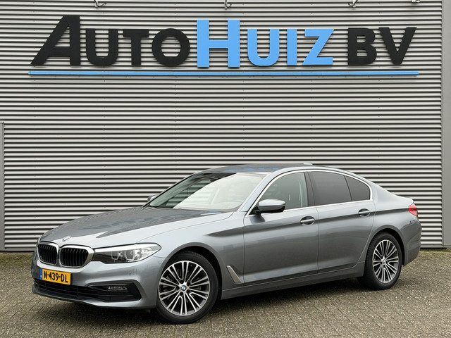 BMW 5 Serie 520i Sport Line Executive Leer Head-Up Display Achteruitrijcamera Stoelverwarming Trekha