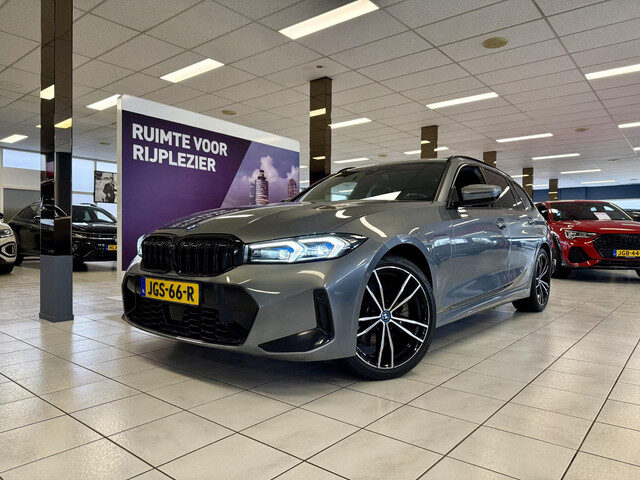 BMW 3 Serie touring 330e xDrive *PANO*H&K*360CAM*LEER*HUD*VOL*