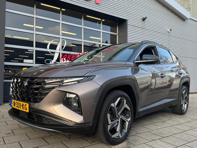 Hyundai TUCSON Hybrid 1.6 T-GDI HEV Premium- Navigatie I Leer I Airco I Sport velgen I LED I PDC I D