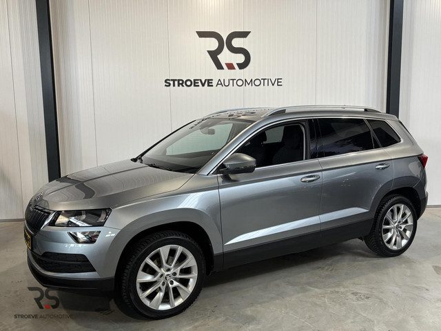 Škoda Karoq 1.0 TSI 115 pk handg. Ambition Buss. | Navi | Cruise | PDC | CarPlay | Clima | DAB | Org