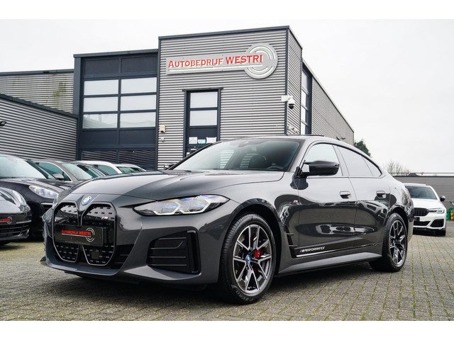 BMW i4 M50 High Executive 84 kWh | BTW | 360 Camera | LASER | Dravitgrau metallic | Adaptieve Cruise