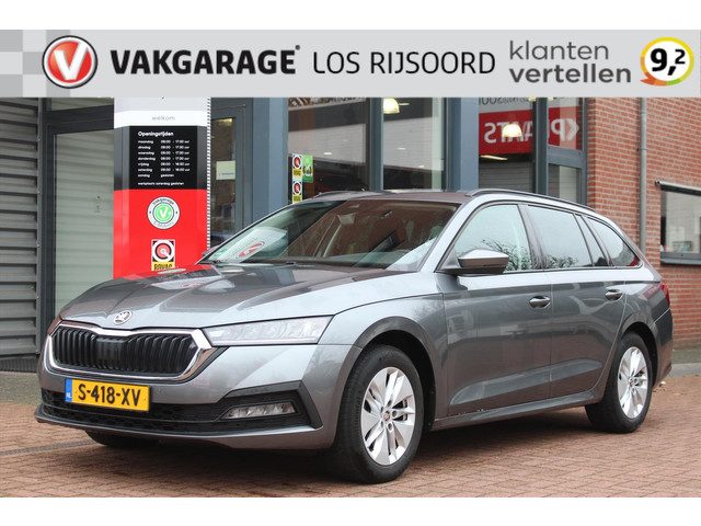 Škoda Octavia Combi 1.0 TSI Hybrid DSG *Ambition* | Trekhaak | Carplay | Cruise & Climate | PDC | Na
